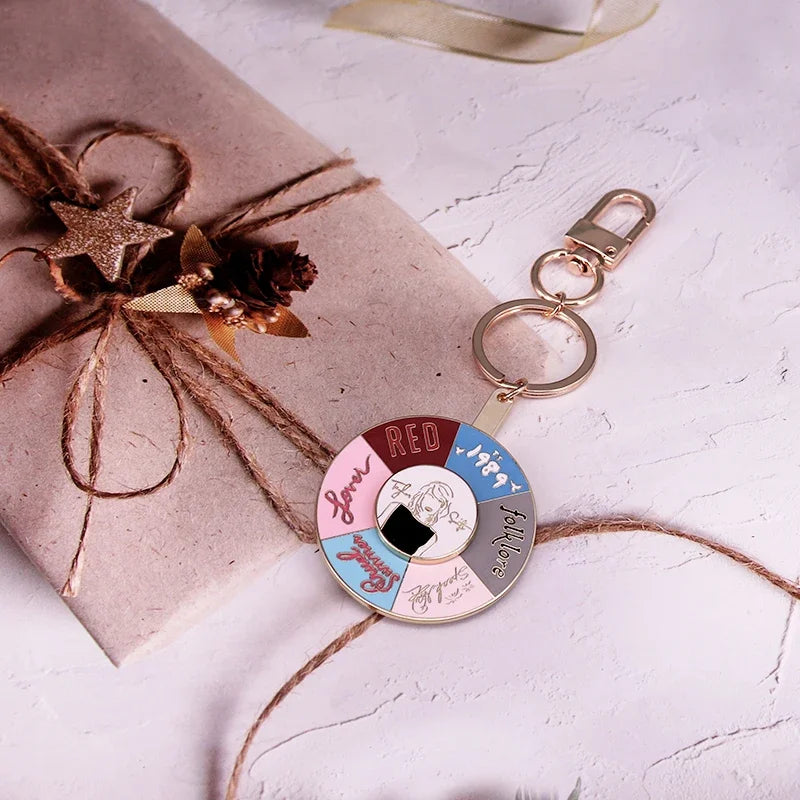 Rotating Album Keychain – Cute Collector Spinner Keychain for Swifties | Multi-Era Metal Pendant - élise & madelyn