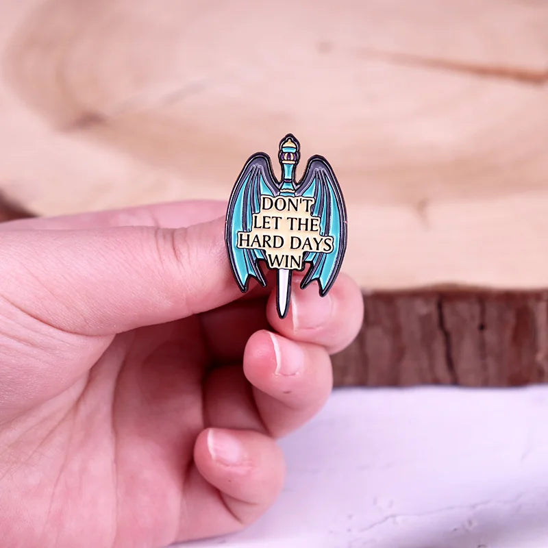 “Don’t Let the Hard Days Win” Enamel Pin – Inspirational Reader Quote Brooch